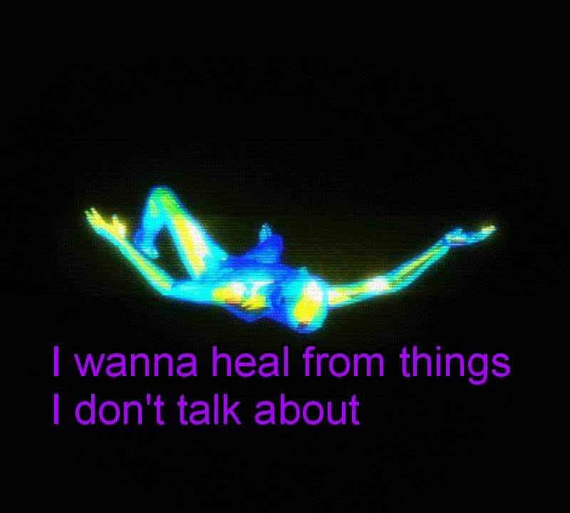 The meme depicts a person in a fetal position, curled up and crying, with a distressed expression. The text below the image reads: "I wanna talk to the people I love, but I don't talk to the people I love."